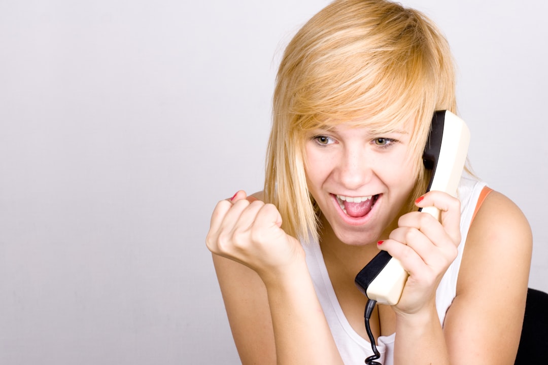 Confident person negotiating bills over the phone
