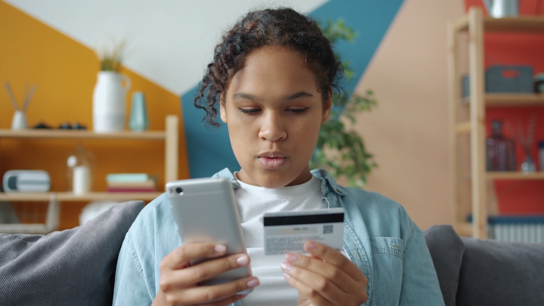 Person using banking app on phone for financial planning